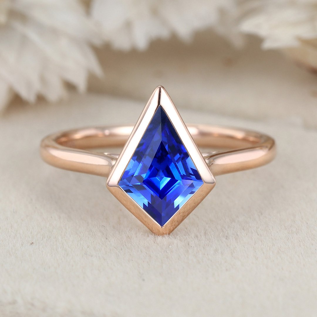 Blue Sapphire Engagement Ring with Flower Halo - Nathan Alan Jewelers