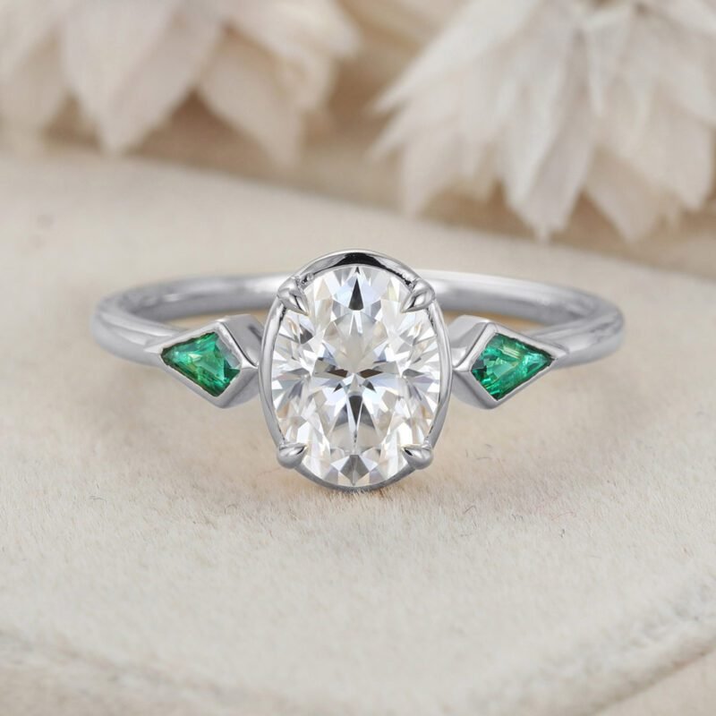 Bezel Set Oval Cut Moissanite Engagement Ring Unique 14K Yellow Gold Lab Emerald Side Stone Ring Delicate Wedding Ring