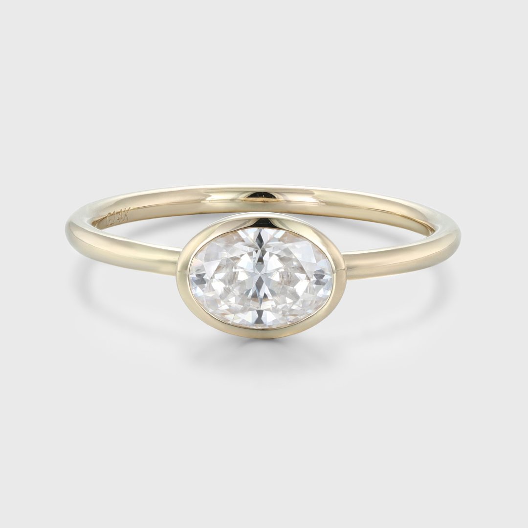 East West Bezel Set 1 Carat Oval Cut Moissanite Solitaire Ring In 14K  Yellow Gold