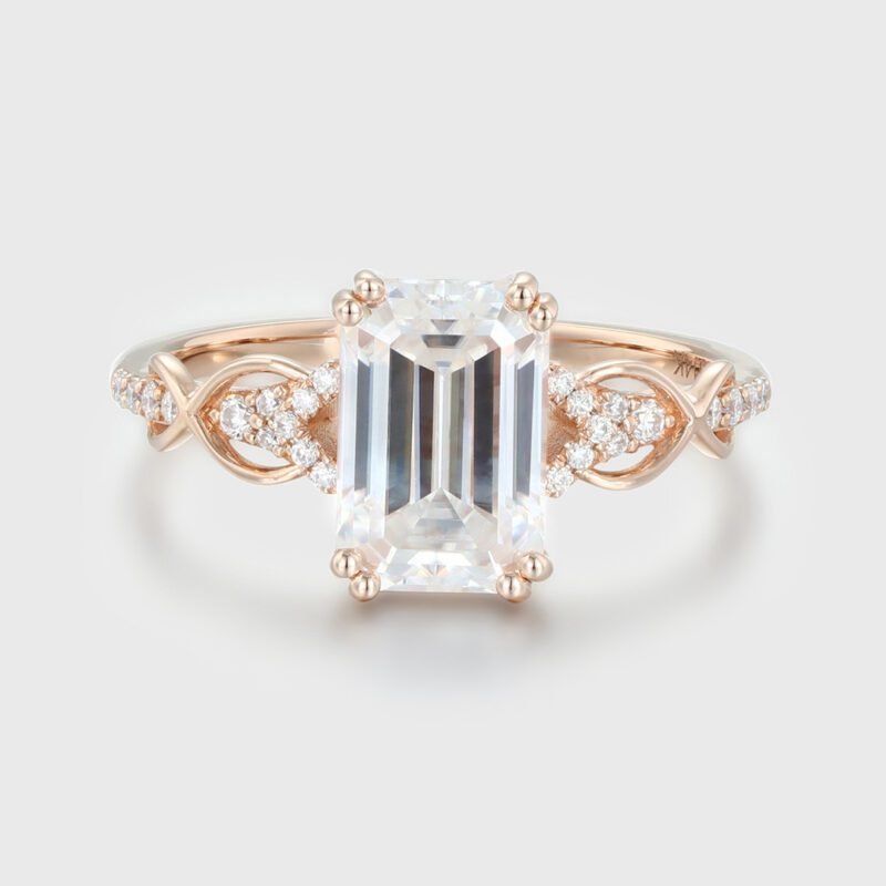 2 Carat Emerald Cut Moissanite Twist Engagement Ring In 14k Rose Gold