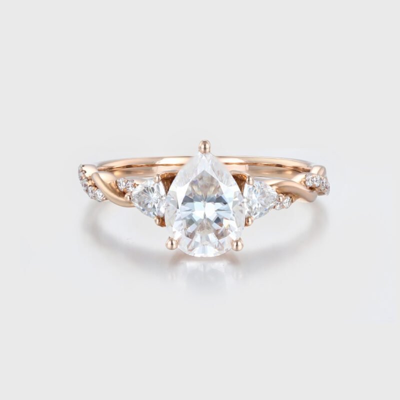 1.5ct Pear Shape Moissanite Twist Engagement Ring In 14K Rose Gold