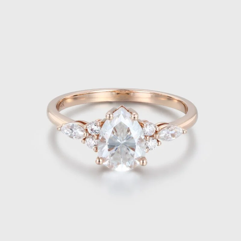 1.5 Carat Pear Shaped Moissanite Engagement Ring In 14K Rose Gold