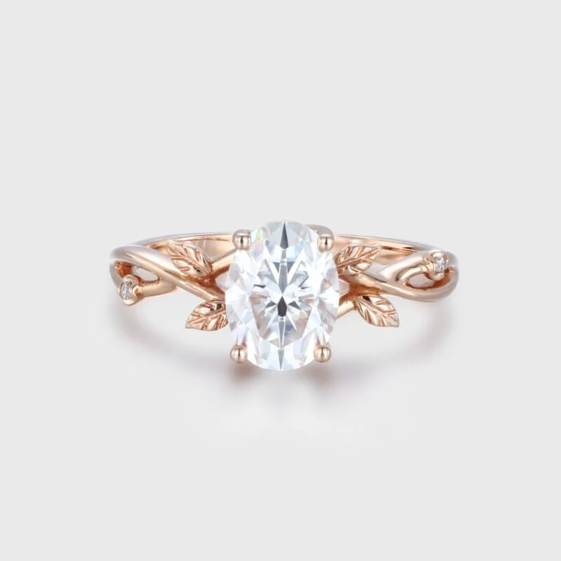 Vintage 1.5 Carat Oval Moissanite Engagement Rings. The Art Deco Leaf design in 14k Rose Gold